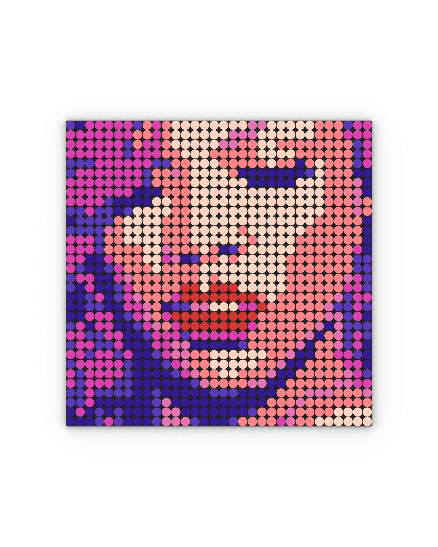 Mosaico cuadrado compuesto por piezas circulares estilo LEGO que forman el rostro de una mujer con los ojos cerrados y labios pintados de rojo. El retrato utiliza tonos de piel, fucsia, púrpura y rojo para dar profundidad y contraste. La imagen está inspirada en la portada del álbum Loud de Rihanna, reinterpretada con una estética pixelada y vibrante.